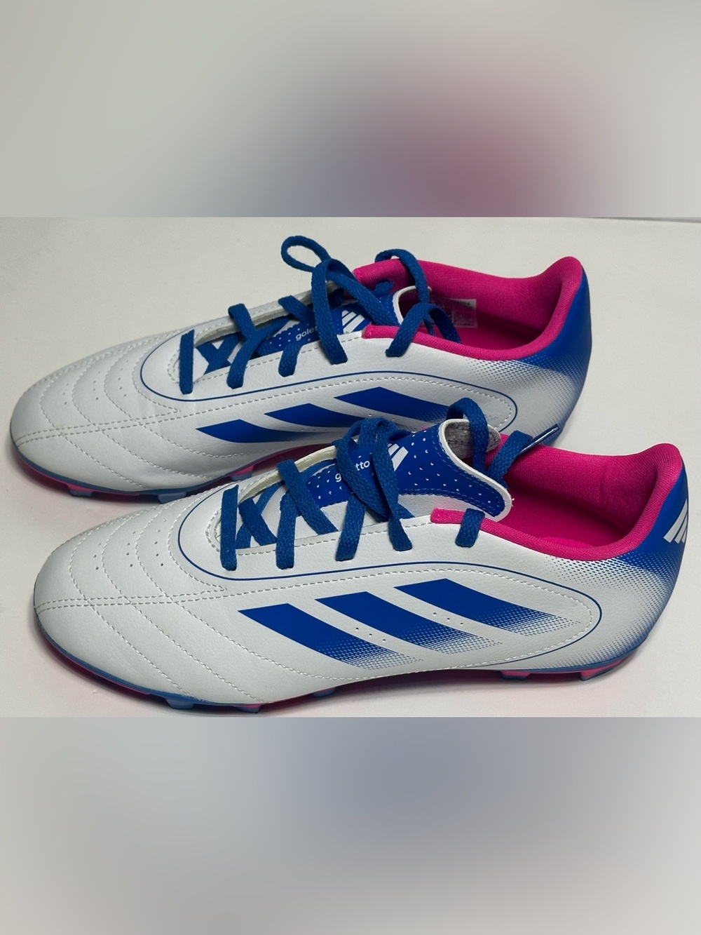 Adidas Goletto Youth  soccer cleats in a white blue and pink Size 5